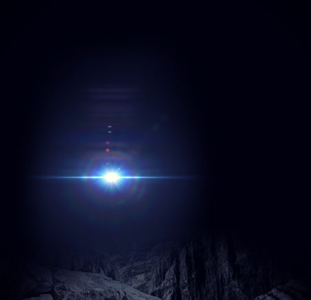 Bright blue-white light source is illuminating rugged rocky canyon at night in 3D render. Aurora,...