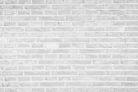 Flat design is featuring white painted brick wall filling frame with soft shading, copy space. Minimalist, texture, urban, architecture, interior, modern, neutralの写真素材