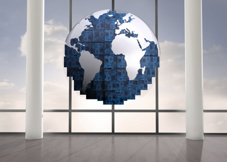 Digitally generated blue globe floating in roomの写真素材