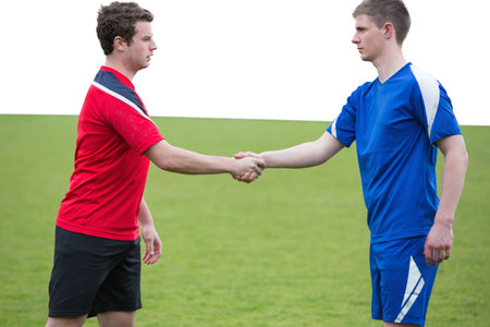 Football players shaking hands