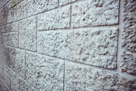 Grey brick wall backgroundの写真素材