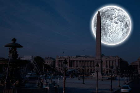 Digital composite of Large moon over cityの写真素材