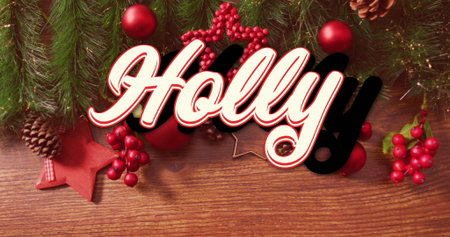 Showcasing decorative sign 'Holly' on wooden tabletop, with evergreen branches, red berries, cones. Festive, holiday, seasonal, rustic, cozy, celebration, winterの写真素材