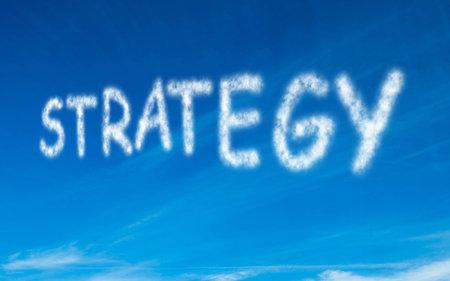 Strategy written in white in skyの写真素材