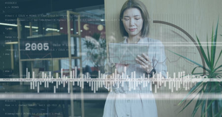 Analyzing businesswoman reviewing tablet data at office lounge, with chart overlays and coffee cups....