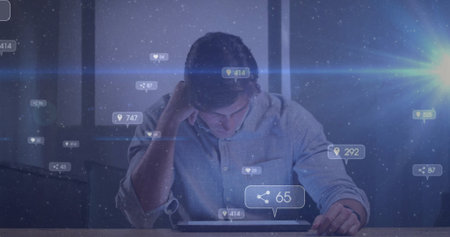 Leaning worker wearing button-up shirt interacting with tablet in office, floating digital icons....