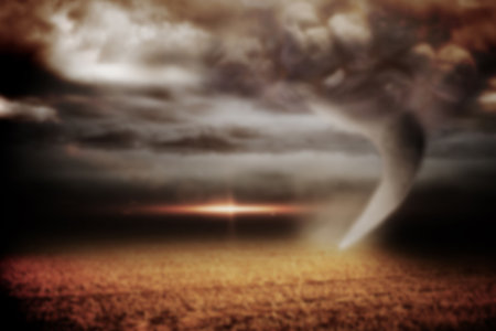 Landscape during tornado disaster against sky in stormy weather