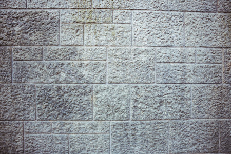 Grey brick wall backgroundの写真素材