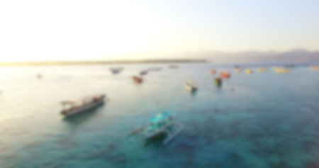 Boats on sea against clear sky