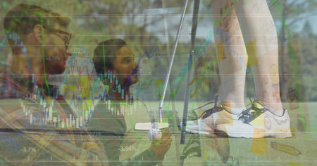 Seated men leaning at putting green, with stock charts, coffee cup, golf putter, ball, copy space. Outdoor, leisure, collaboration, analysis, technology, nature, casualの写真素材