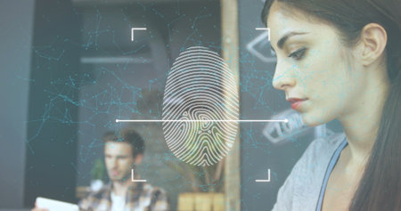 Hispanic woman undergoing facial recognition mesh with fingerprint icon in tech office, copy space. Biometric, security, innovation, digital, technology, workplace, professionalの写真素材