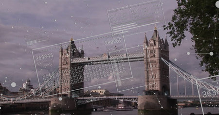 Displaying Tower Bridge over Thames London riverfront, with moored boat and digital data overlays. Gothic, architecture, digital, urban, reflective, data, navigationの写真素材
