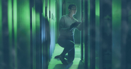 Examining technician wearing gloves inspecting servers with tablet in data center, with LED lights....