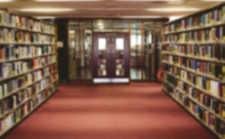 Various books on shelf in empty library