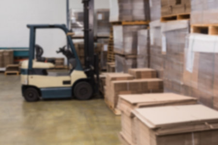 Forklift in industrial distribution warehouse