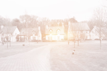 row of houses with bright light and park