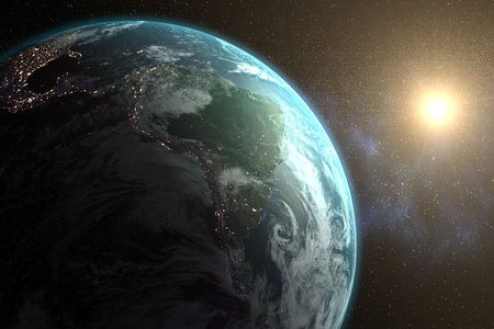 Planet earth against bright sun in milky way