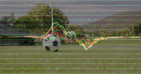 Showing soccer ball resting on field by arched pavilion and goalpost, with grid lines, waveforms. Sports, technology, data visualization, outdoor, landscape, fitness, innovationの写真素材