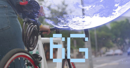 Displaying digital globe 5G text, woman in denim jacket holding bicycle on urban street, copy space. Urban, transportation, technology, connectivity, modern, travel, outdoorの写真素材