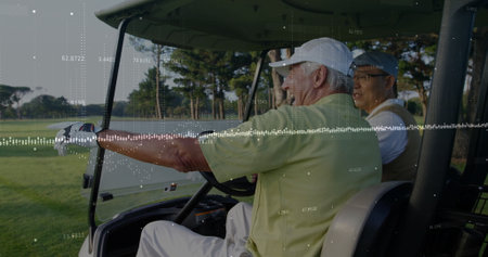 Pointing senior golfer in green polo guiding friend in golf cart on fairway, with glove, clubs. Luxury, recreation, leisure, elegance, teamwork, outdoor, lifestyleの写真素材