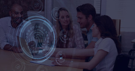 Professionals reviewing logs on laptop at office conference table with holographic fingerprint icon....