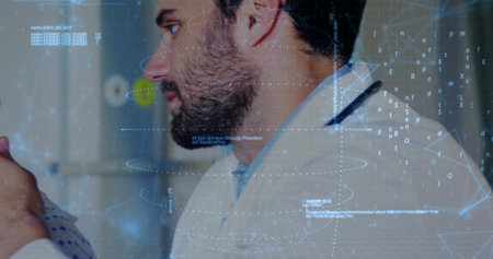 Physician embracing patient in exam room, with lab coat, stethoscope and holographic graphics....
