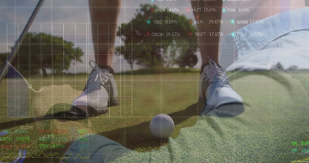 Aligning male golfer's shoes for putting on golf course green, with golf ball, data overlay. Athletic, sport, precision, outdoor, competitive, modern, technologyの写真素材