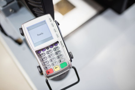 Close-up of credit card reader at supermarket