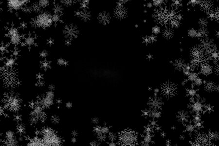 Digitally generated White snowflake design on blackの写真素材
