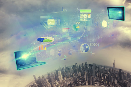 flat design laptop is projecting data beam over urban skyline with tablet, charts and icons....
