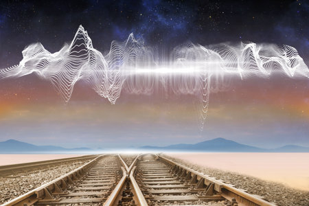 Digitally generated train tracks under energy wave in desert