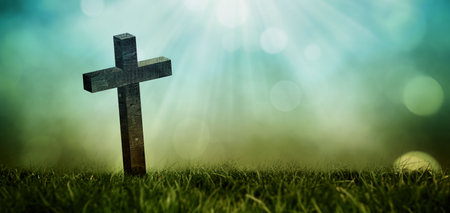 Flat design is featuring wooden cross rising from grass, glowing under sunbeams over bokeh gradient. Spirituality, reverence, serenity, natural, symbolism, illumination, tranquilityの写真素材