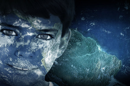 Digital art composition is blending boy's face with satellite Earth overlay and continent map. Futuristic, voyage, cosmic, technology, dialogue, imagination, mindfulnessの写真素材