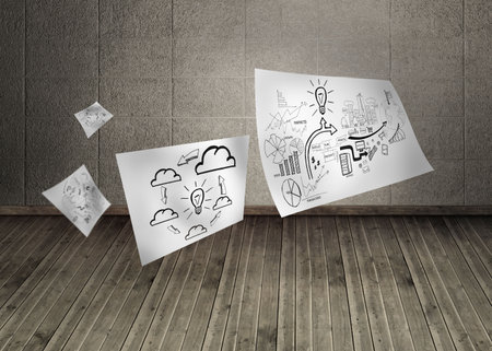 Sheets with graphics in dark roomの写真素材