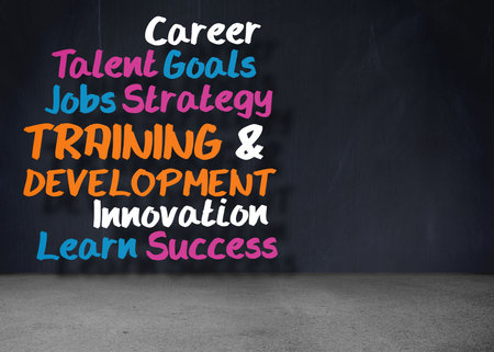 Flat vector motivational words are appearing on chalkboard wall, with concrete floor, copy space. Inspiration, development, education, creativity, teamwork, innovation, empowermentの写真素材