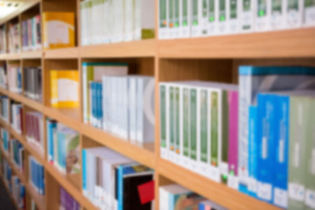 Close-up of books on shelf in library