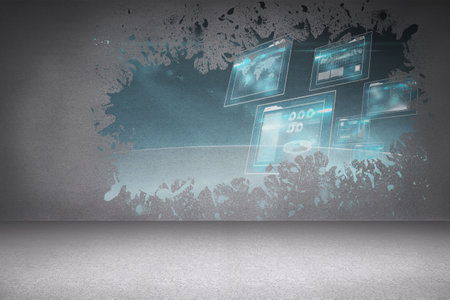 Splash on wall revealing technology interfaceの写真素材
