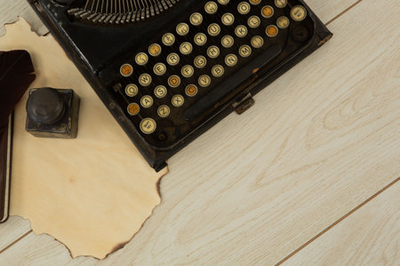 Typewriter and stamp on table, Close-upの写真素材