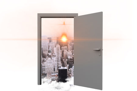 Digital image of open door with cityscape and sunlight on white backgroundの写真素材