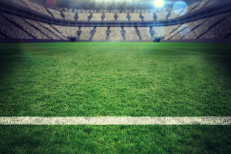 Empty soccer grass field is being shown under stadium seating tiers and floodlights in flat design. Stadium, sports arena, illumination, athletic, modern, recreation, outdoorの写真素材