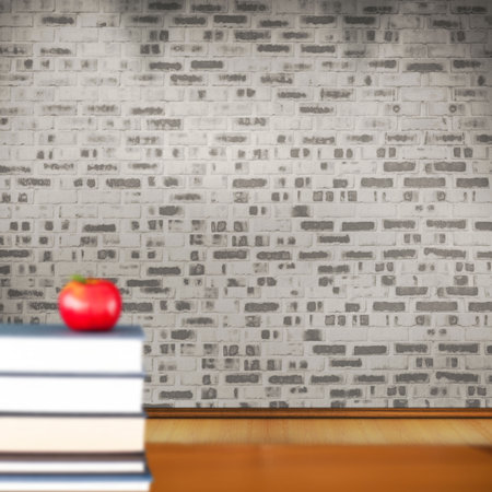 Red apple on pile of booksの写真素材