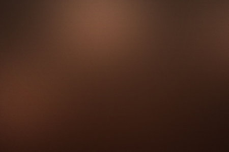 Flat design abstract art is showing continuous brown blur gradient filling entire frame. Minimalist, color gradient, digital art, background texture, warm tones, modern design, abstract patternの写真素材