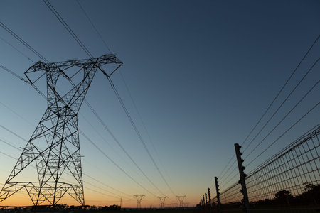 The evening electricity pylon silhouetteの写真素材