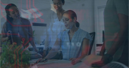 Reviewing blueprint, four women in business attire pointing to plan on office table, with tablet. Collaboration, teamwork, architecture, professional, modern, brainstorming, innovationの写真素材