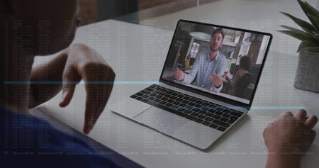 Viewing meeting on laptop screen at home office desk, with succulent, desk divider and code overlay....