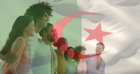 Standing adult friends linking arms and smiling in rolling landscape, with Algerian flag overlay. Unity, diversity, camaraderie, outdoor, celebration, vibrant, togethernessの写真素材