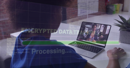 Working clinician in blue scrubs typing on laptop at desk, with encrypted data overlay, copy space....