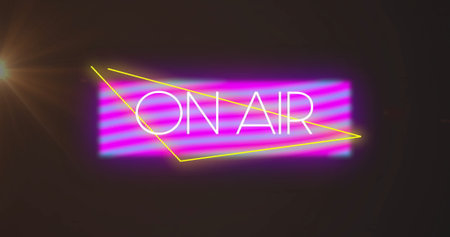 Glowing neon 'ON AIR' sign shining in dark studio, purple-pink panel, yellow lines, warm lens flare....