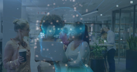 Collaborating professionals pointing at laptop discussing AI at office, with holographic projection....