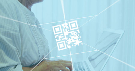 Typing striped-shirted woman on silver laptop at office, with floating QR code graphic, light beams. Technology, communication, innovation, workspace, modern, productivity, digitalの写真素材